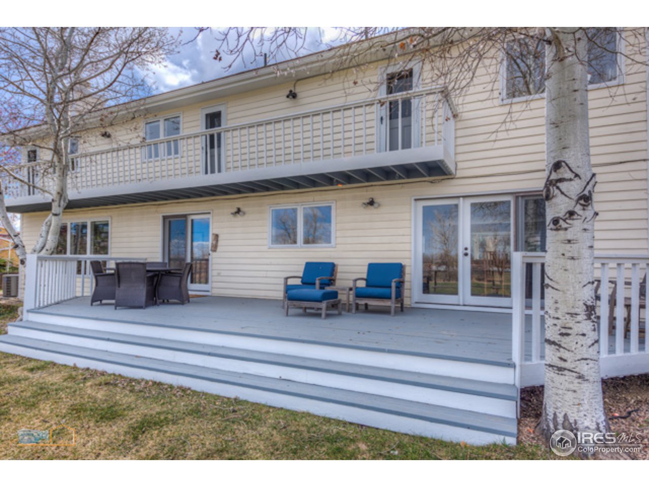 4669 Apple Way Boulder, CO 80301 - Photo 11 of 25 a view of a house with two chairs and table in a patio
