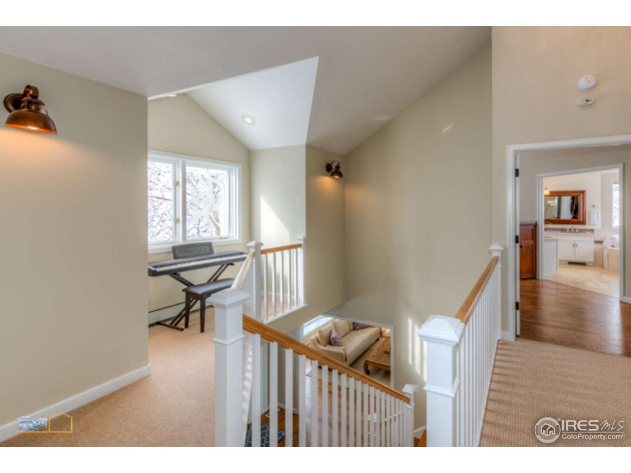 4669 Apple Way Boulder, CO 80301 - Photo 15 of 25 a living room with furniture and a wooden floor
