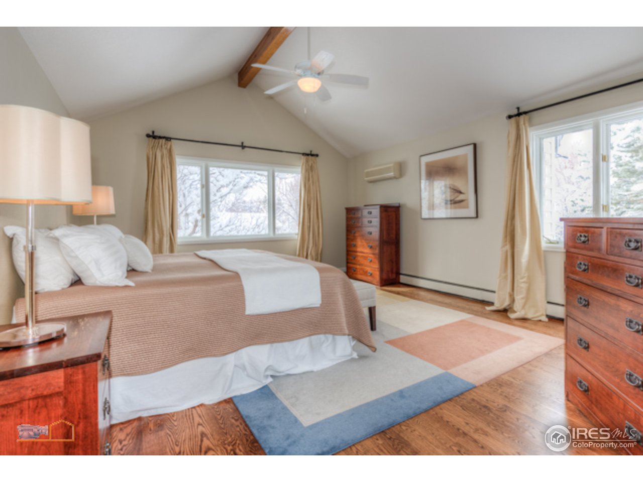4669 Apple Way Boulder, CO 80301 - Photo 16 of 25 a living room with furniture and a flat screen tv