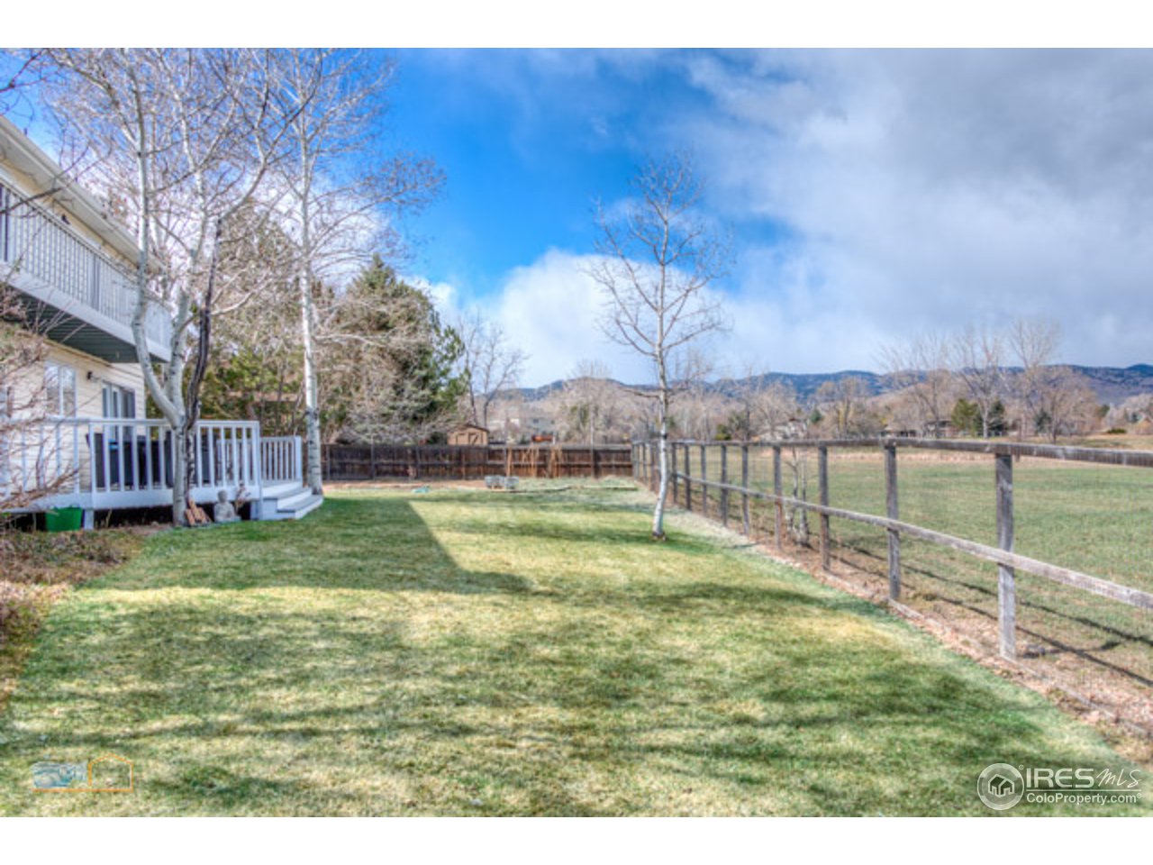 4669 Apple Way Boulder, CO 80301 - Photo 9 of 25 a view of yard with swimming pool and green space