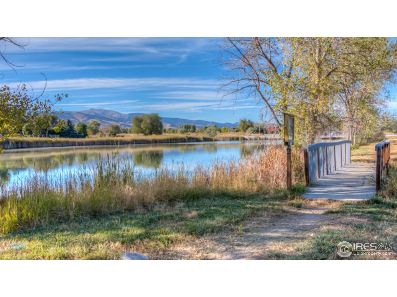 4669 Apple Way Boulder, CO 80301 - Photo 10 of 25 a backyard of a house with lots of green space