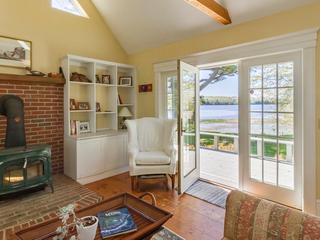 643 Browns Point Road Bowdoinham, ME 04008 - Photo 11 of 32 Built in shelves and cabinets on...