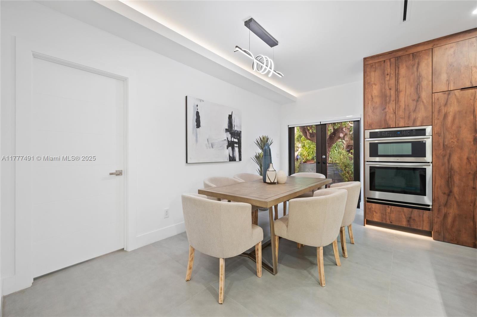2268 Southwest 16th Terrace Miami, FL 33145 - Photo 11 of 34 a dining room with furniture and window