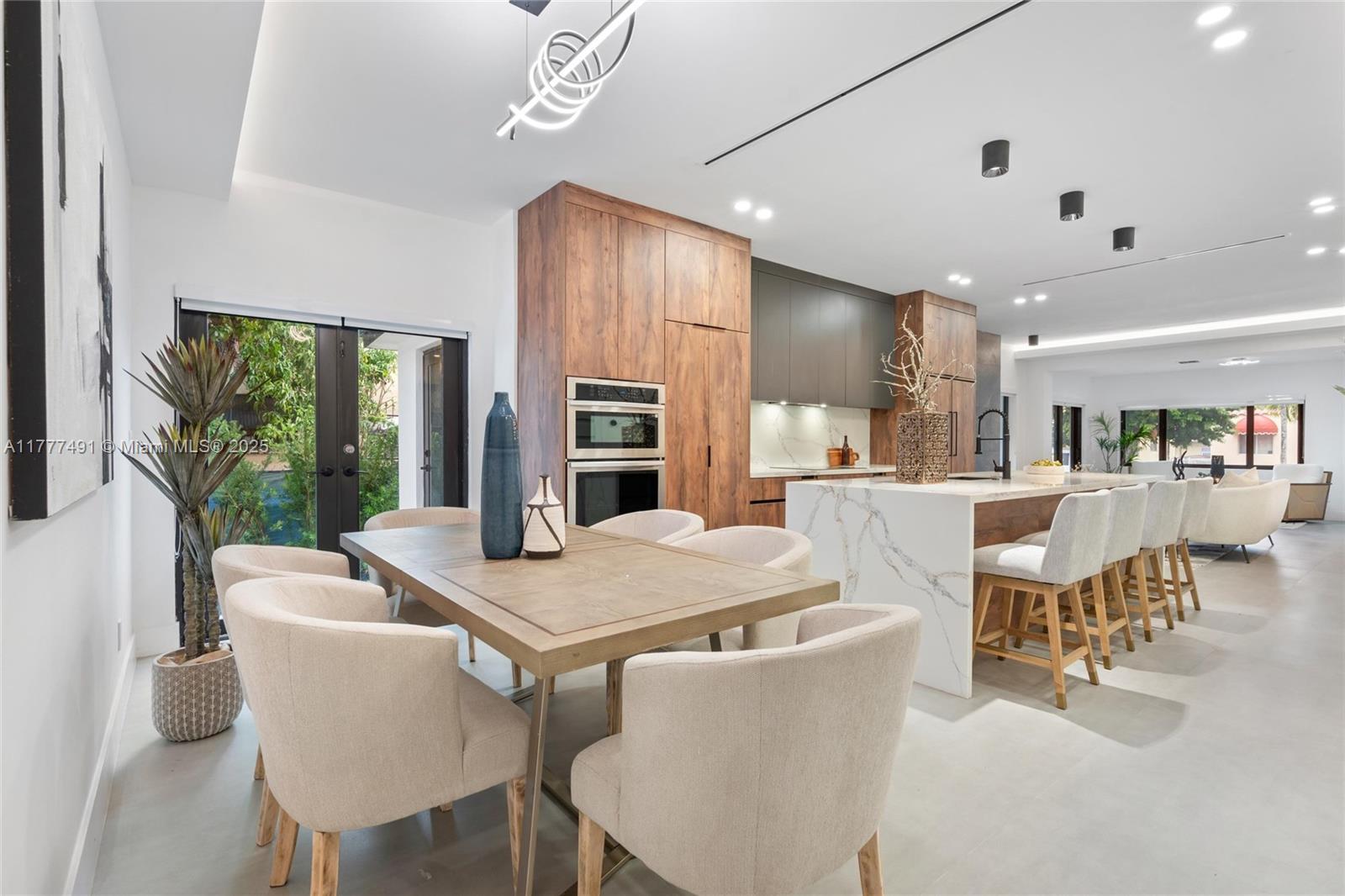 2268 Southwest 16th Terrace Miami, FL 33145 - Photo 12 of 34 a view of a dining room with furniture window and outside view