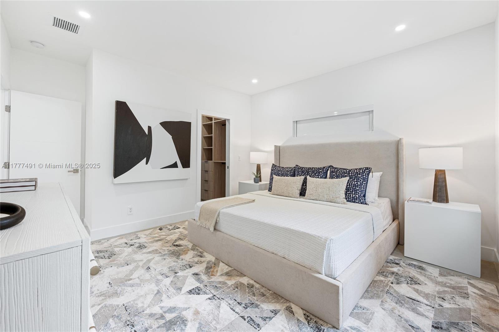 2268 Southwest 16th Terrace Miami, FL 33145 - Photo 15 of 34 a bedroom with a bed and a stove top oven