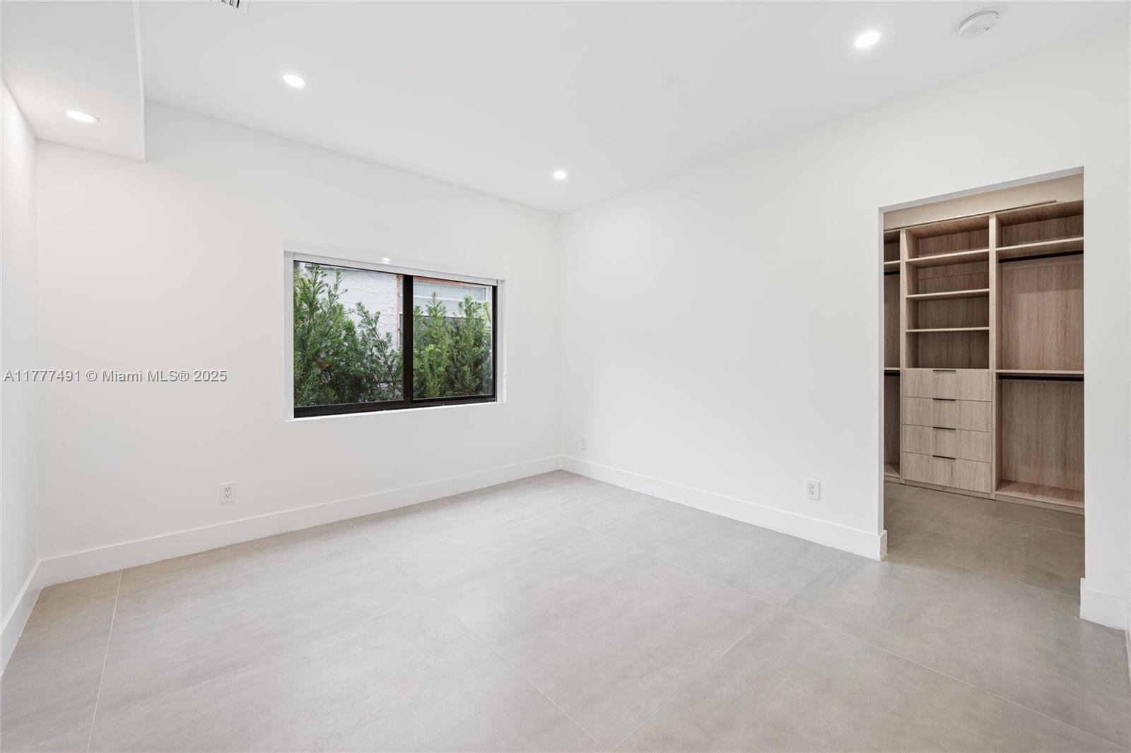 2268 Southwest 16th Terrace Miami, FL 33145 - Photo 18 of 34 an empty room with windows