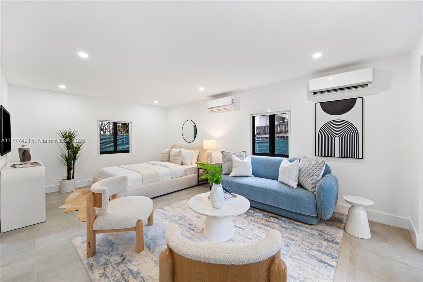 2268 Southwest 16th Terrace Miami, FL 33145 - Photo 27 of 34 a living room with furniture and a view of kitchen