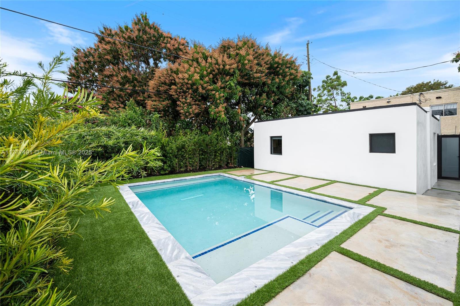 2268 Southwest 16th Terrace Miami, FL 33145 - Photo 32 of 34 a view of a backyard with pool