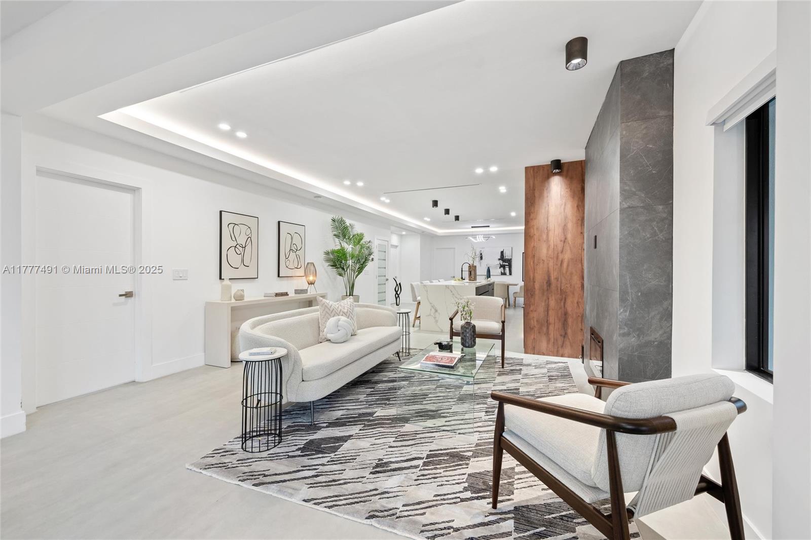 2268 Southwest 16th Terrace Miami, FL 33145 - Photo 7 of 34 a living room with furniture and a large window