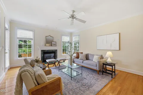 a kitchen with stainless steel appliances granite countertop a refrigerator a stove and a sink