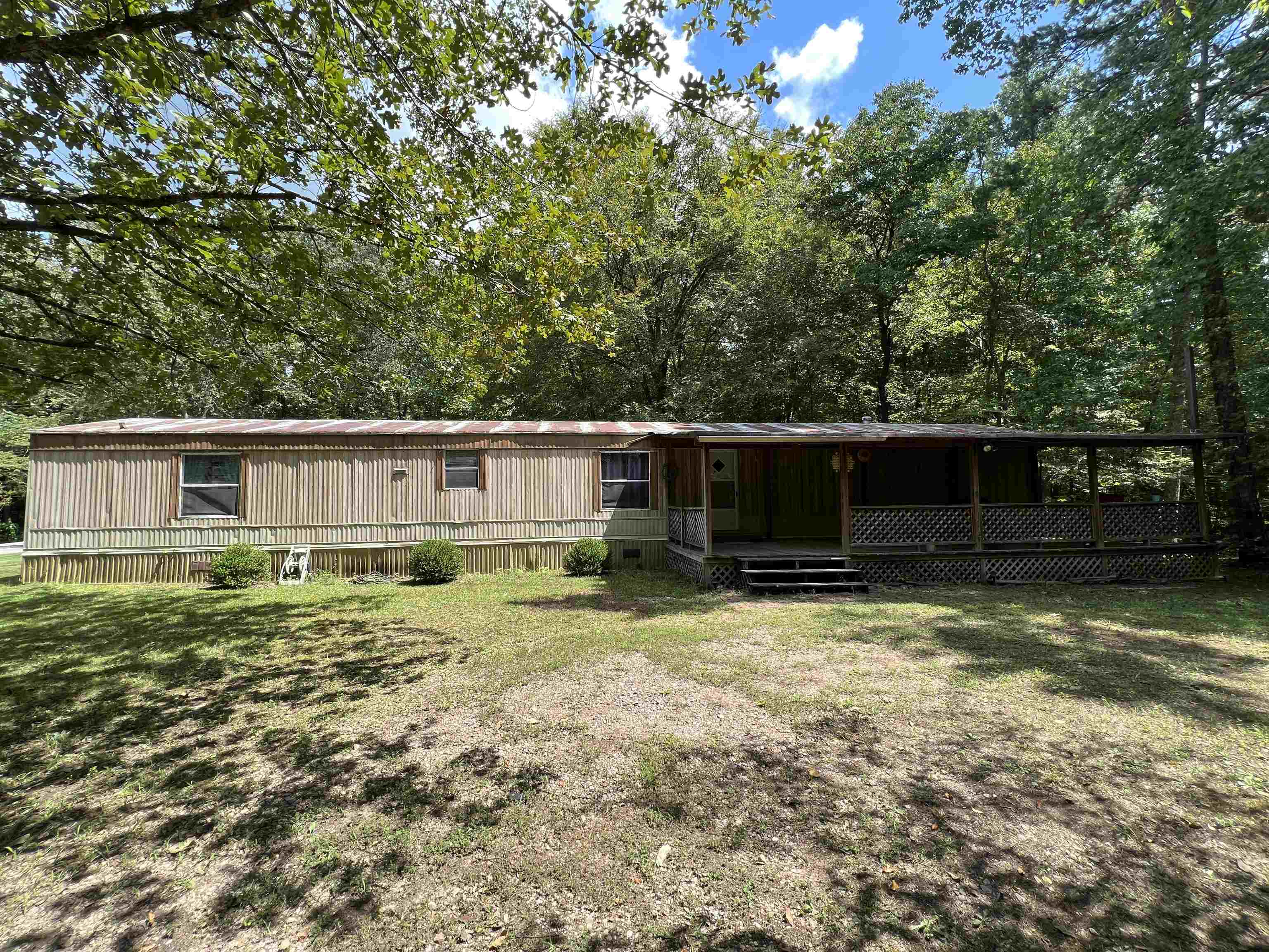 265 Cardinal Road Counce, TN 38326 - Photo 1 of 13 a view of a house with a yard