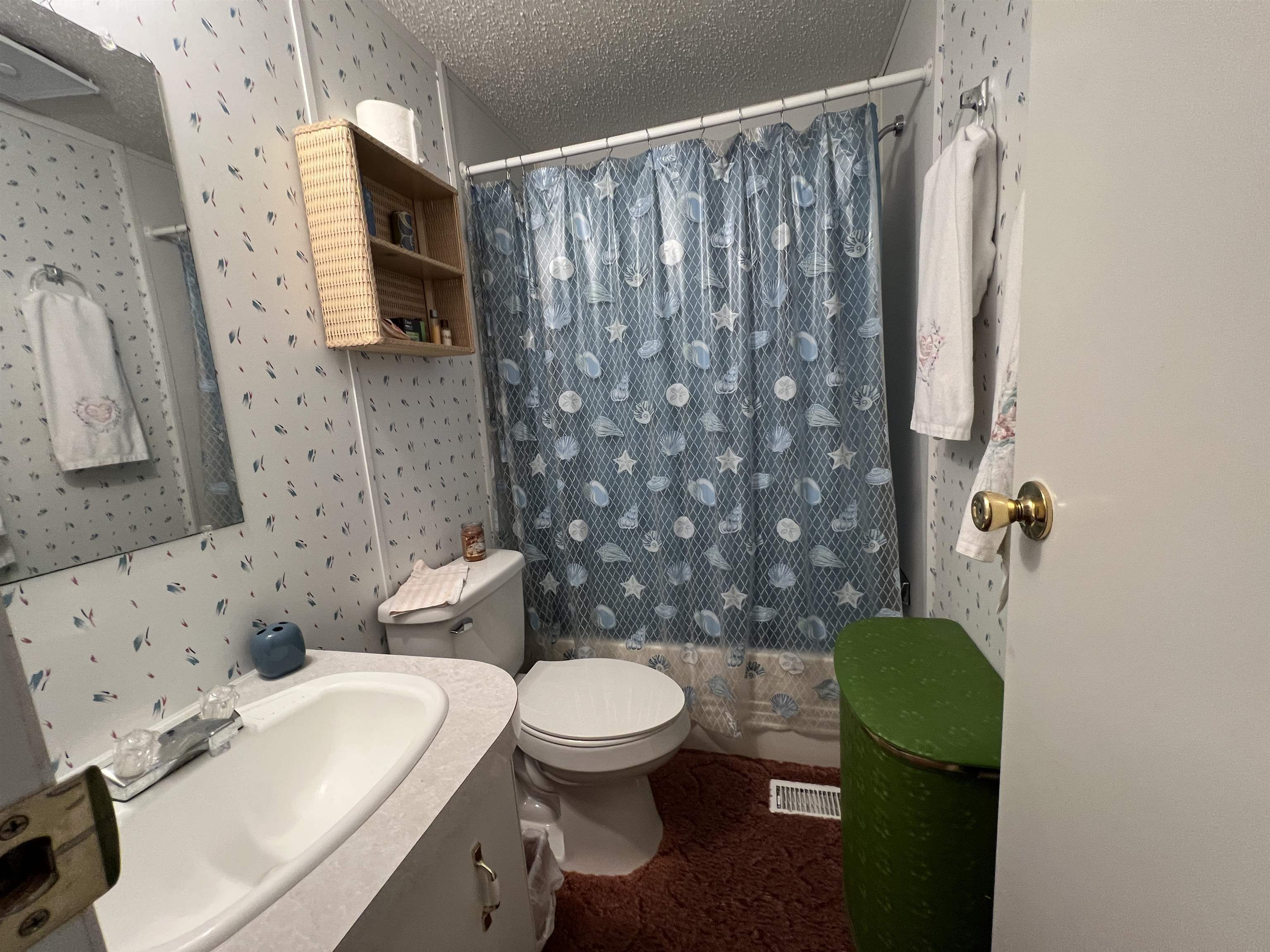 265 Cardinal Road Counce, TN 38326 - Photo 10 of 13 a bathroom with a sink toilet and shower
