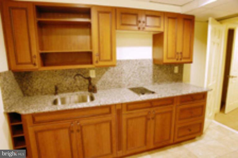21815 Woodfield Road Gaithersburg, MD 20882 - Photo 22 of 29 Recreation room kitchenette!