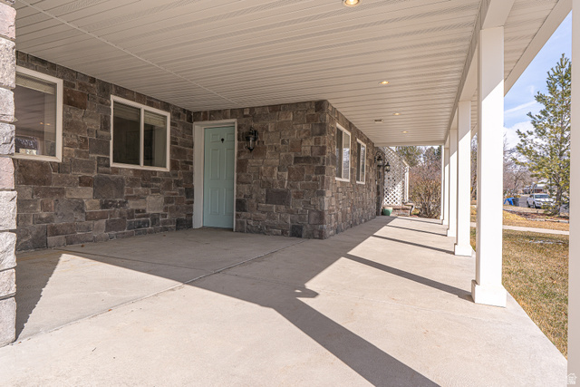 1045 Fox Farm Road Logan, UT 84321 - Photo 4 of 65 View of patio featuring an attached carport