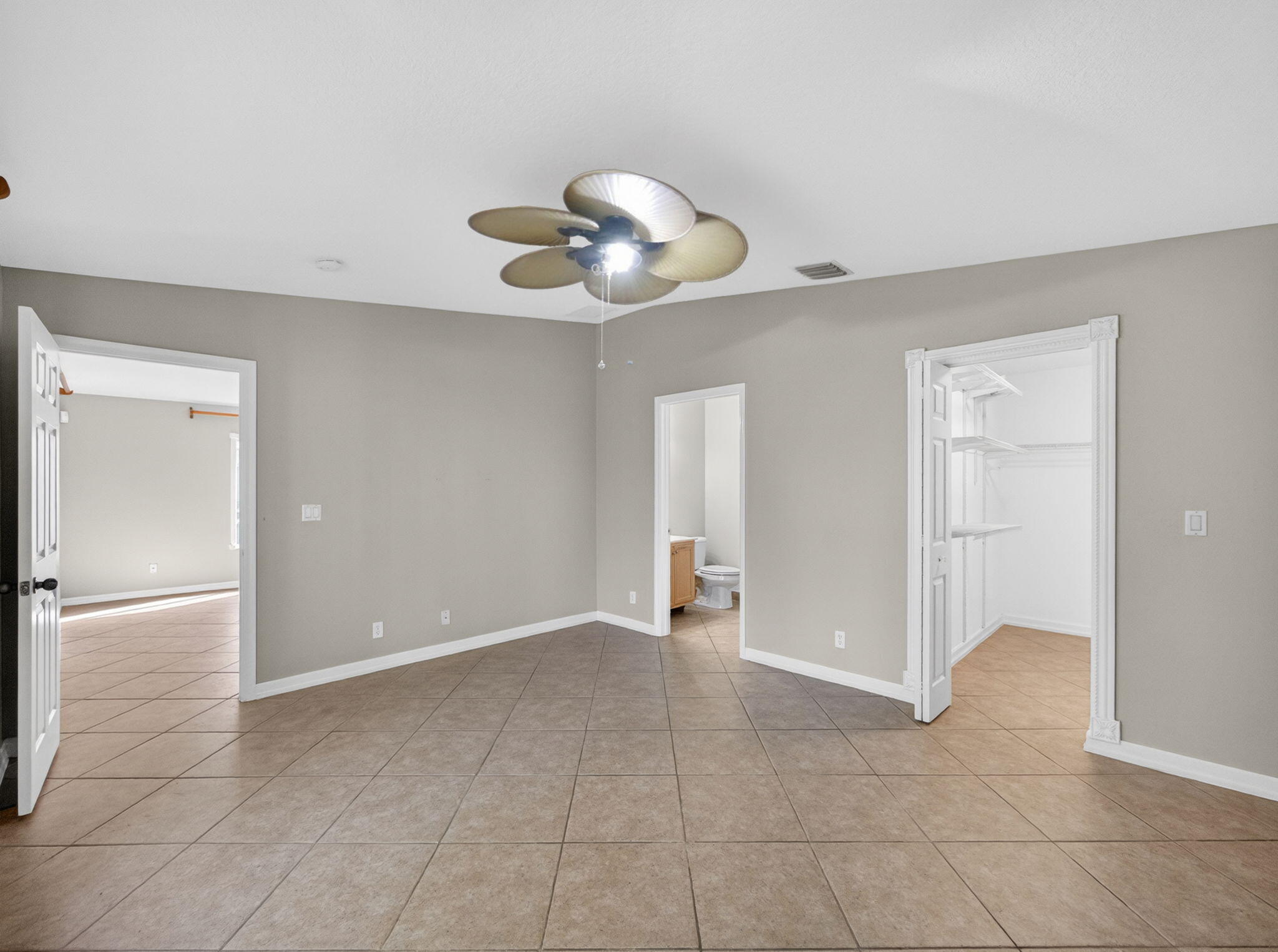 4358 Southeast Graham Drive Stuart, FL 34997 - Photo 14 of 38 a view of an empty room with a bathroom