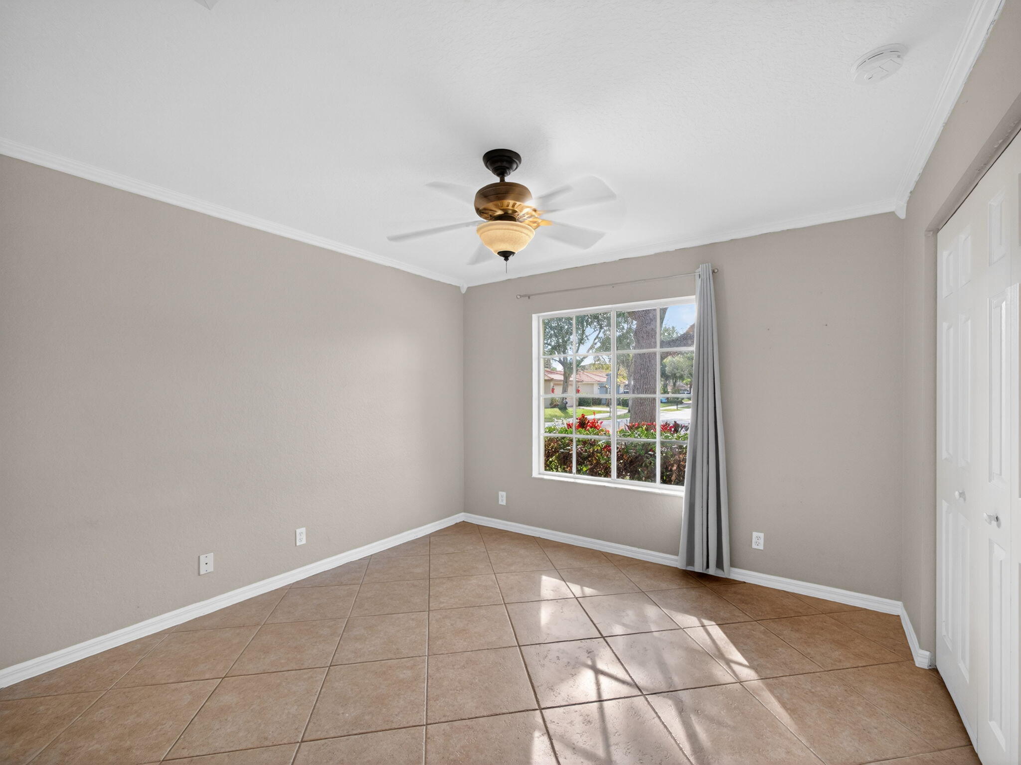 4358 Southeast Graham Drive Stuart, FL 34997 - Photo 20 of 38 a view of an empty room with a window