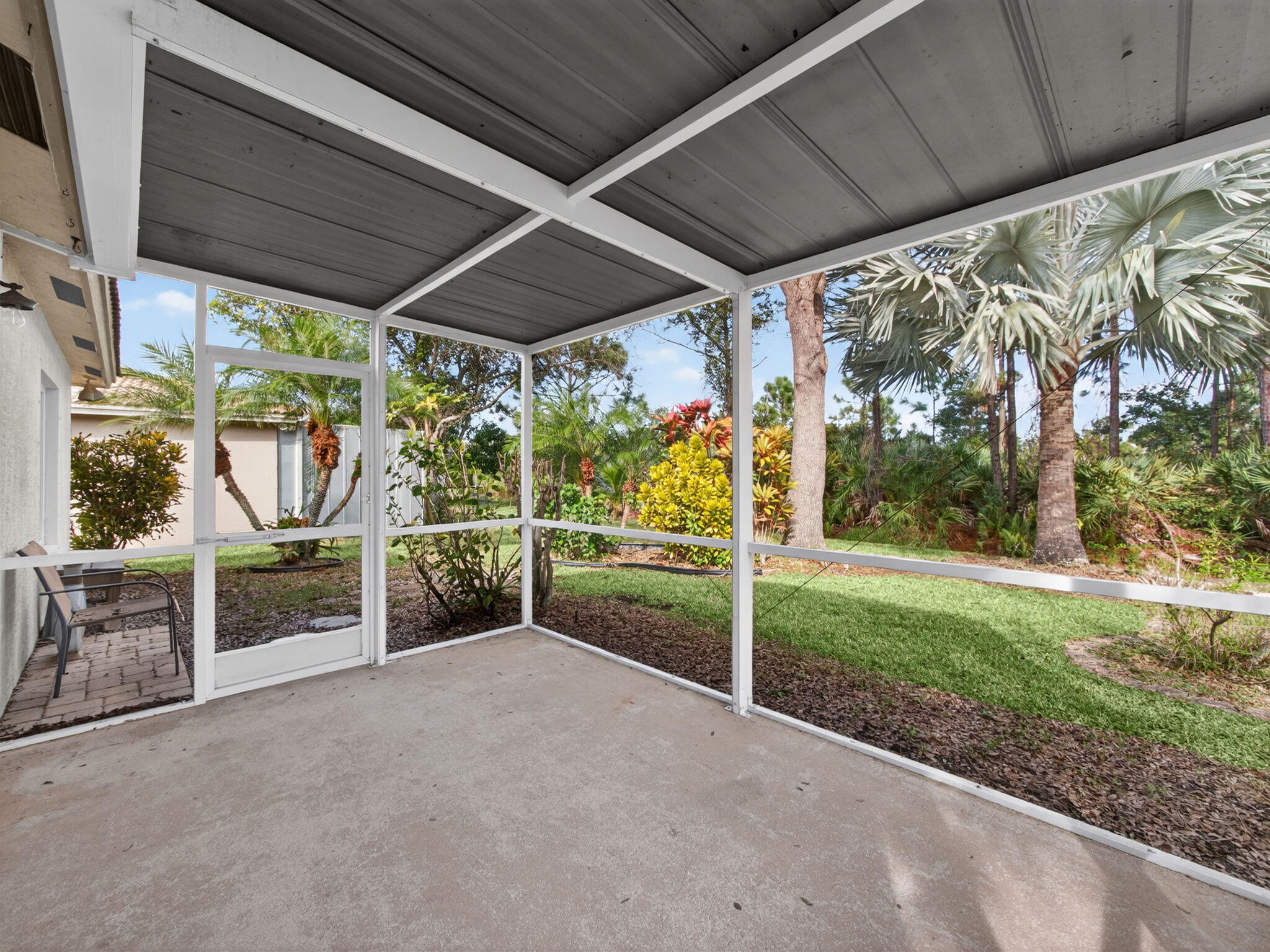 4358 Southeast Graham Drive Stuart, FL 34997 - Photo 27 of 38 a view of a porch with furniture