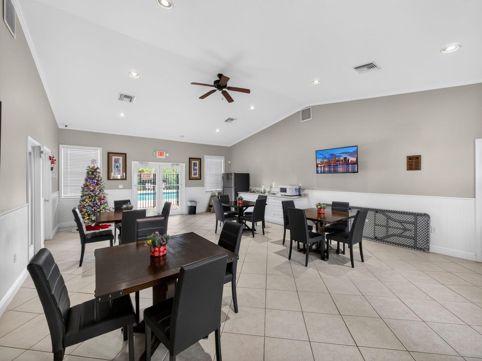 4358 Southeast Graham Drive Stuart, FL 34997 - Photo 37 of 38 a view of a dining room with furniture
