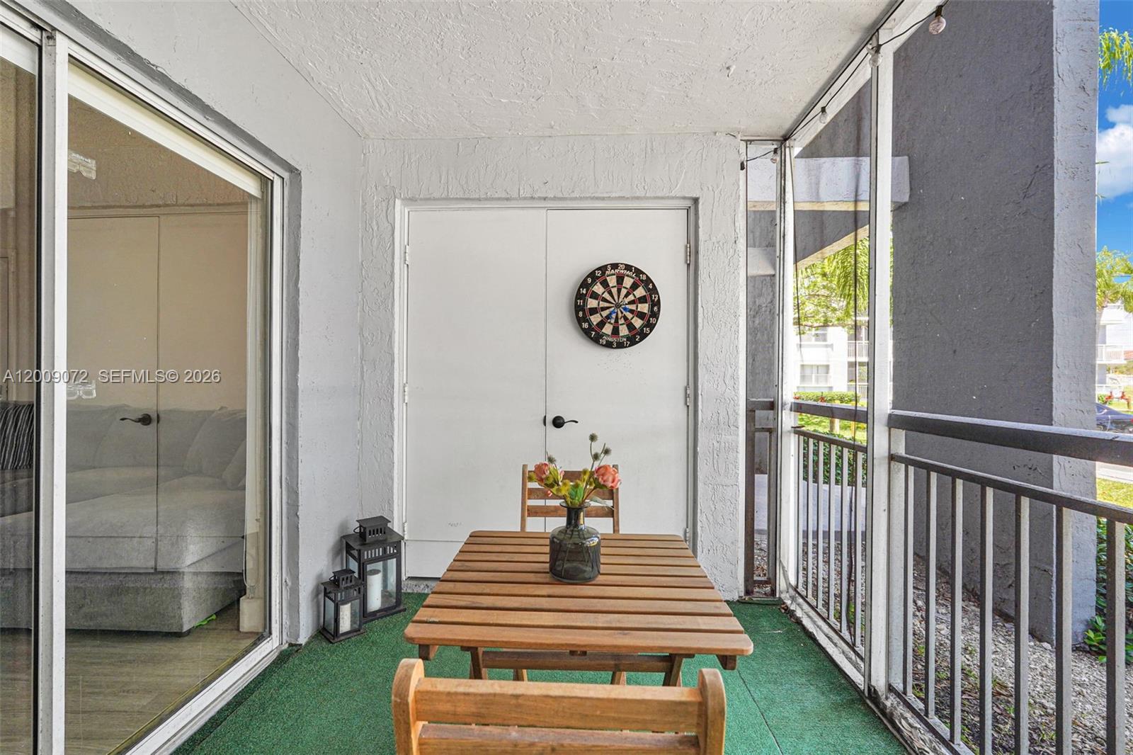 8680 Southwest 212th Street, Unit 105 Cutler Bay, FL 33189 - Photo 12 of 47 Living Room Balcony