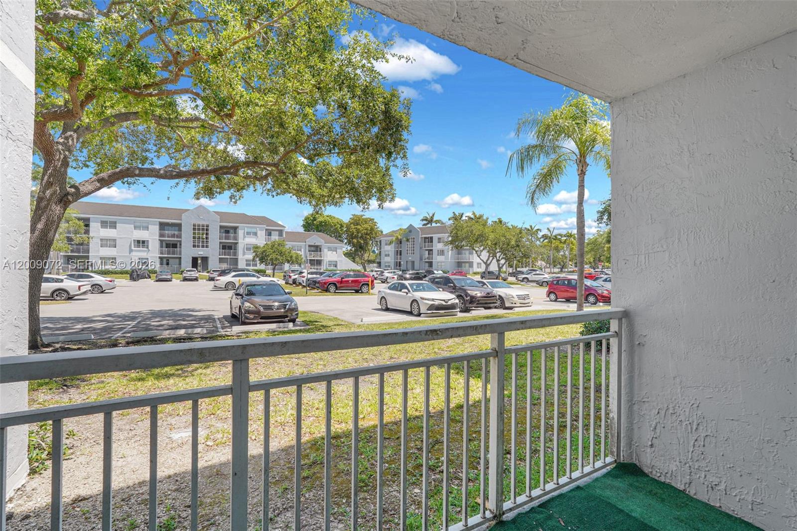8680 Southwest 212th Street, Unit 105 Cutler Bay, FL 33189 - Photo 26 of 47 Primary Bedroom Balcony