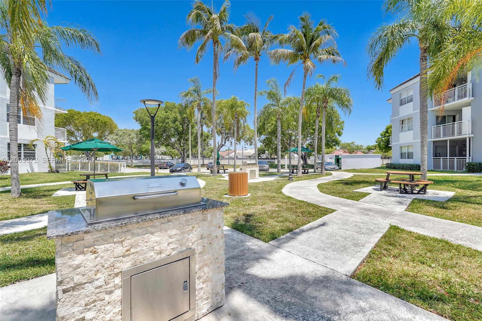 8680 Southwest 212th Street, Unit 105 Cutler Bay, FL 33189 - Photo 42 of 47 BBQ Area