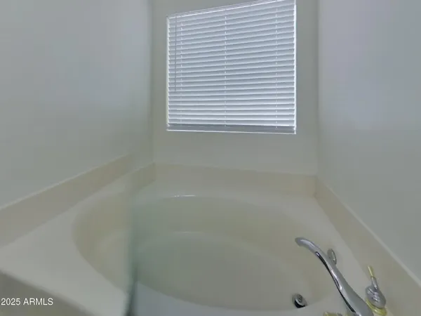 a close up of a bathtub in a bathroom