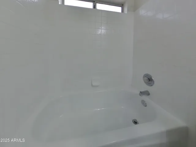 a close up of a bathtub