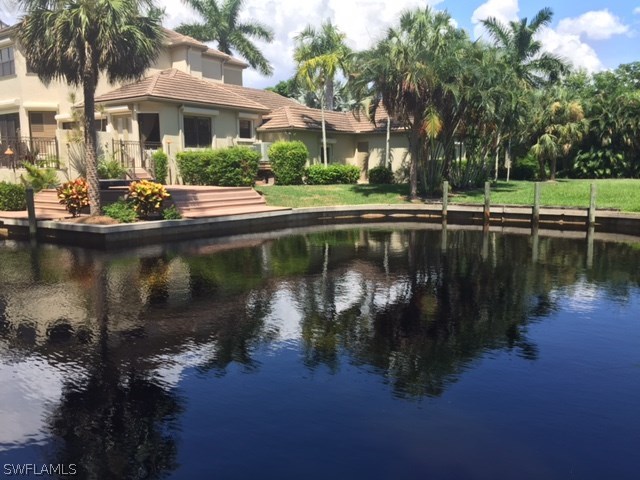 13200 Linton Road Fort Myers, FL 33908 - Photo 5 of 10 a view of a lake with a house