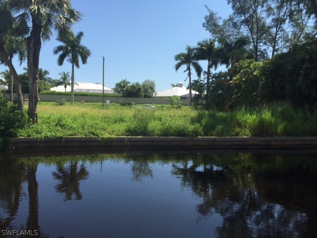 13200 Linton Road Fort Myers, FL 33908 - Photo 10 of 10 a view of a lake with a yard and outdoor seating