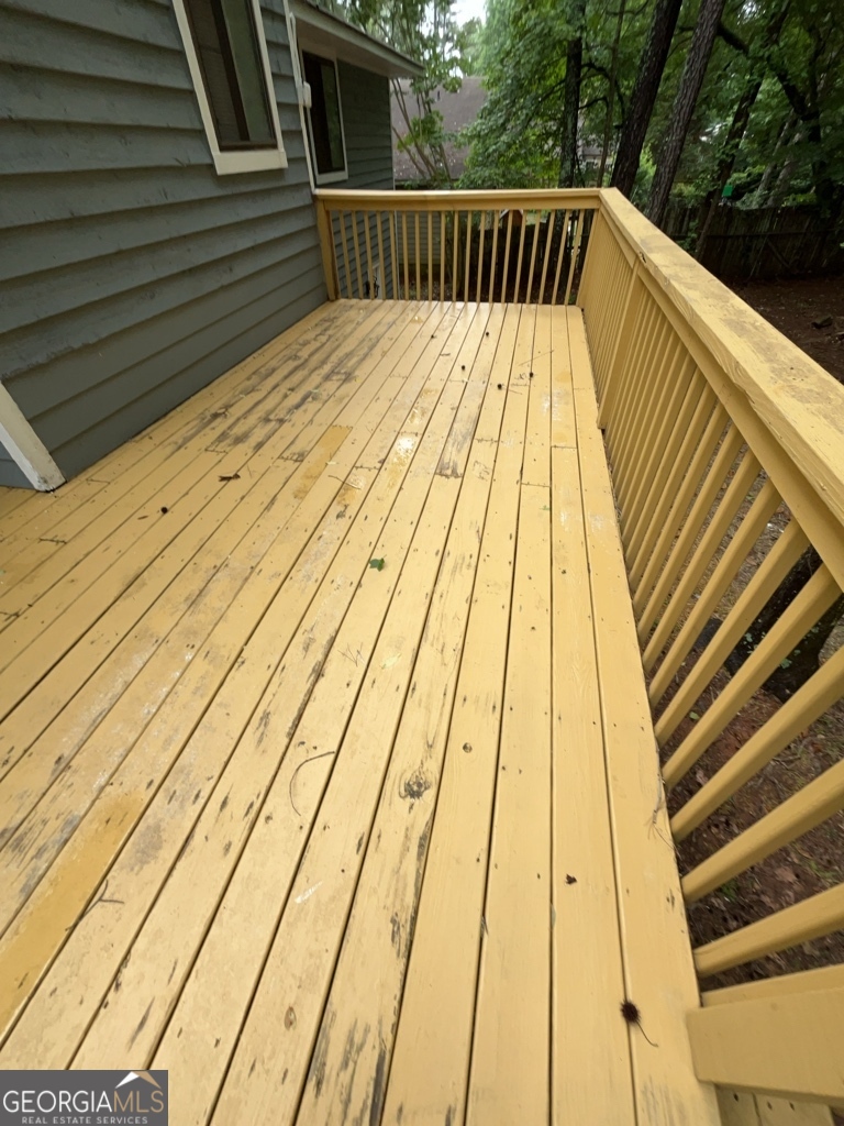 1265 Herrington Road Lawrenceville, GA 30044 - Photo 46 of 52 a view of balcony with wooden floor and fence