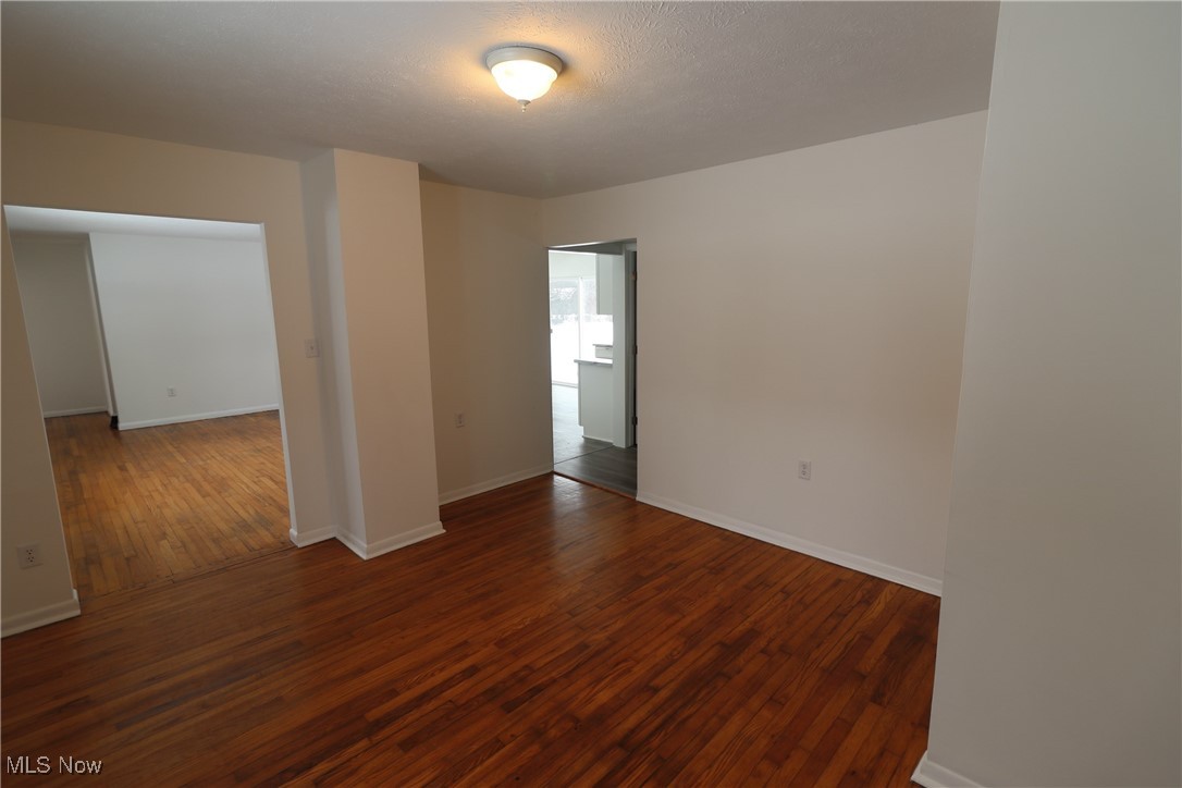 15286 Trask Road Thompson, OH 44086 - Photo 4 of 19 Formal dining room with hardwood floors