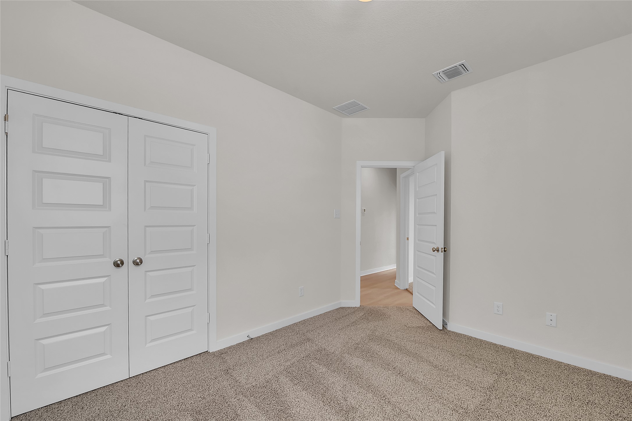 308 Boatright Boulevard Jarrell, TX 76537 - Photo 7 of 31 Unfurnished bedroom featuring a closet and carpet floors