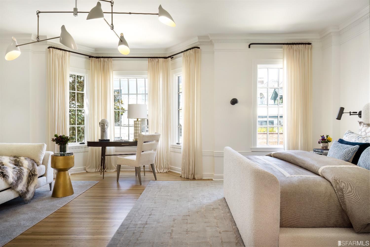 3007 Jackson Street San Francisco, CA 94115 - Photo 11 of 30 a spacious bedroom with a bed and wooden floor