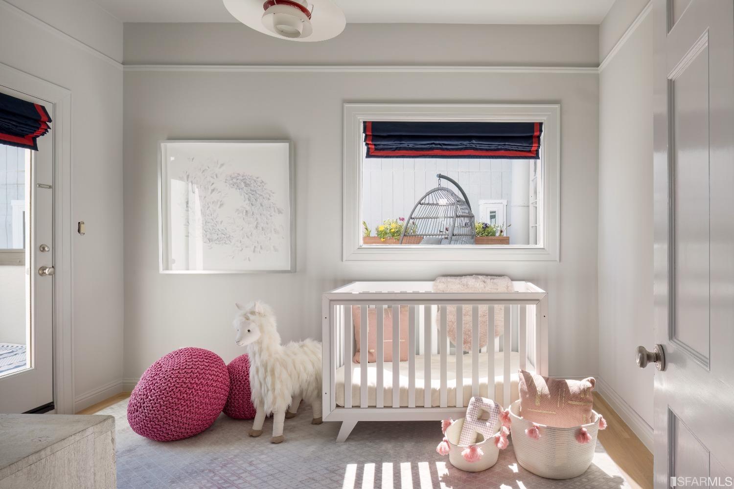 3007 Jackson Street San Francisco, CA 94115 - Photo 16 of 30 a bedroom with a bed and a window