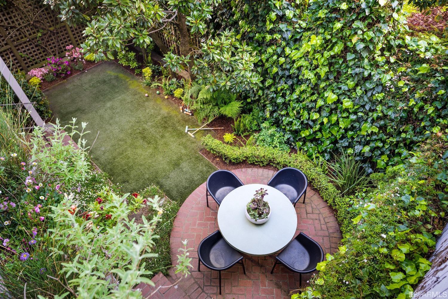 3007 Jackson Street San Francisco, CA 94115 - Photo 27 of 30 a view of a backyard with table and a chairs