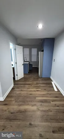 a bathroom with a bathtub and a toilet