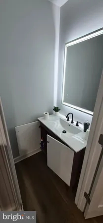 an empty room with wooden floor