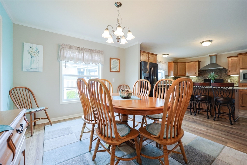 12 Linsay Drive Raynham, MA 02767 - Photo 13 of 28 a view of a dining room with furniture
