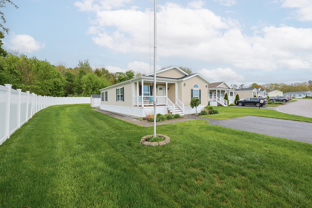 12 Linsay Drive Raynham, MA 02767 - Photo 2 of 28 a house view with a garden space