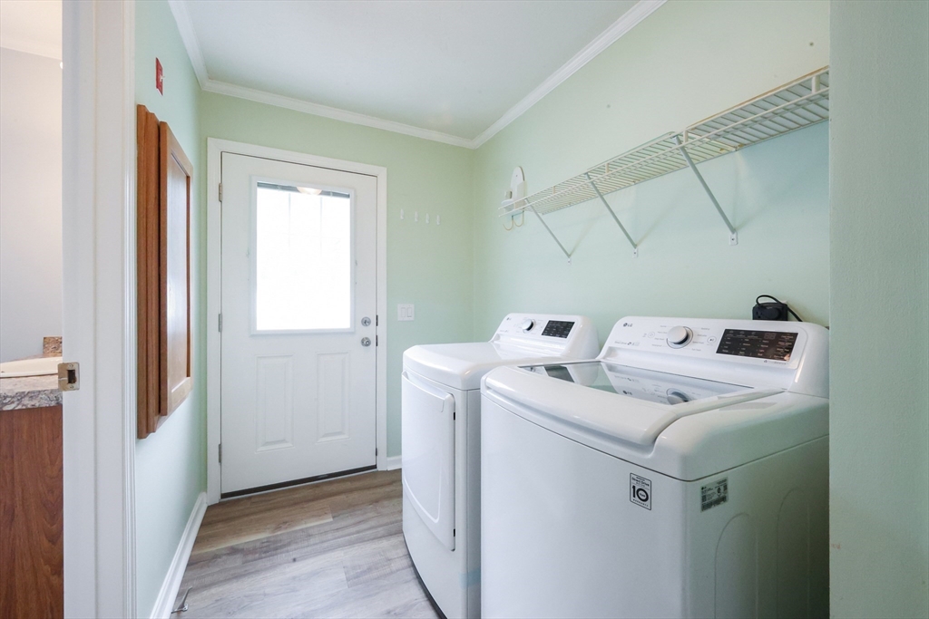 12 Linsay Drive Raynham, MA 02767 - Photo 21 of 28 a utility room with dryer and washer