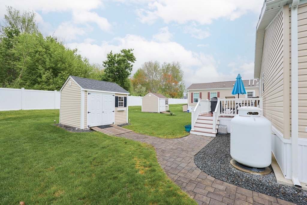 12 Linsay Drive Raynham, MA 02767 - Photo 25 of 28 a house view with a garden space