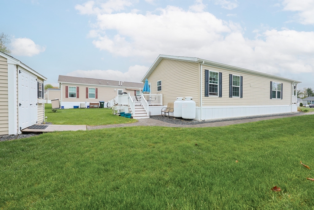 12 Linsay Drive Raynham, MA 02767 - Photo 26 of 28 a view of a house with backyard