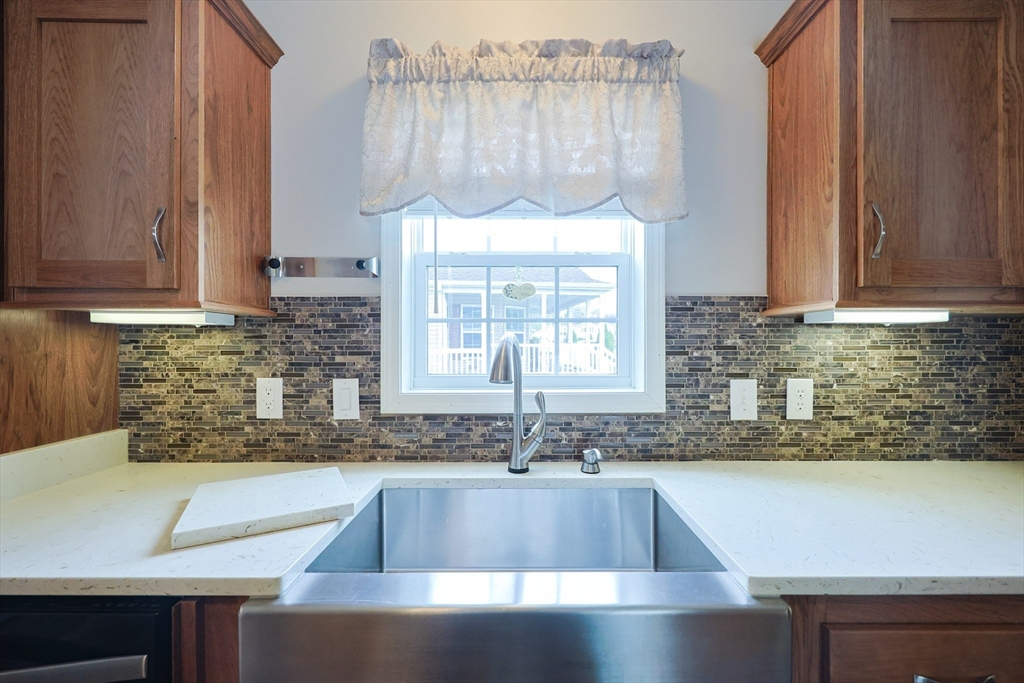 12 Linsay Drive Raynham, MA 02767 - Photo 8 of 28 a kitchen with a sink and large window