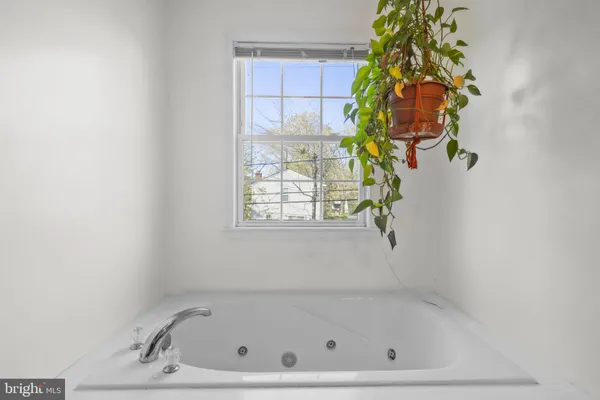 an aerial view of residential houses with swimming pool