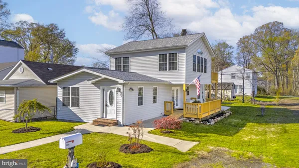 a view of open space with wooden fence