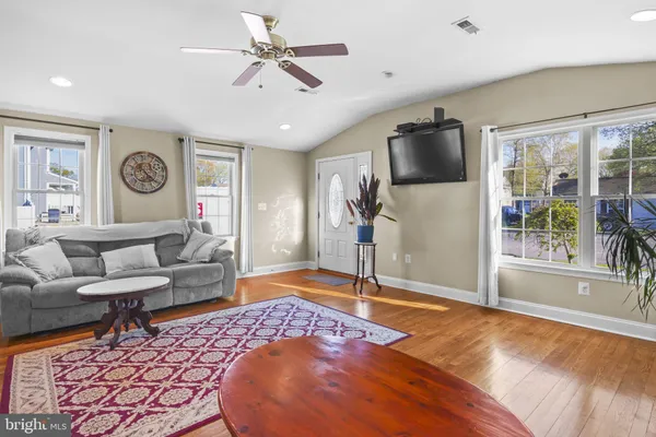 a bed room with a bed and a chandelier