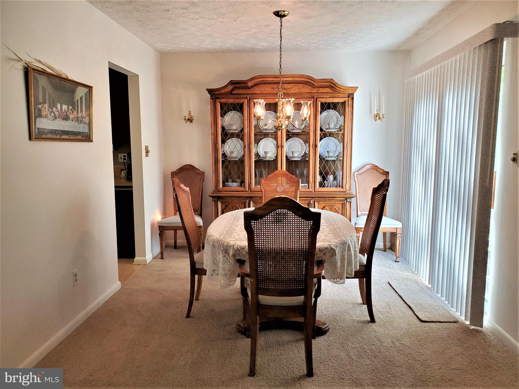 1212 Keithmont Road Catonsville, MD 21228 - Photo 4 of 33 a dining room with furniture and window
