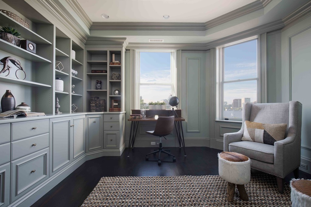 348 Beacon Street, Unit PH Boston, MA 02116 - Photo 19 of 34 a living room with furniture a rug and a window