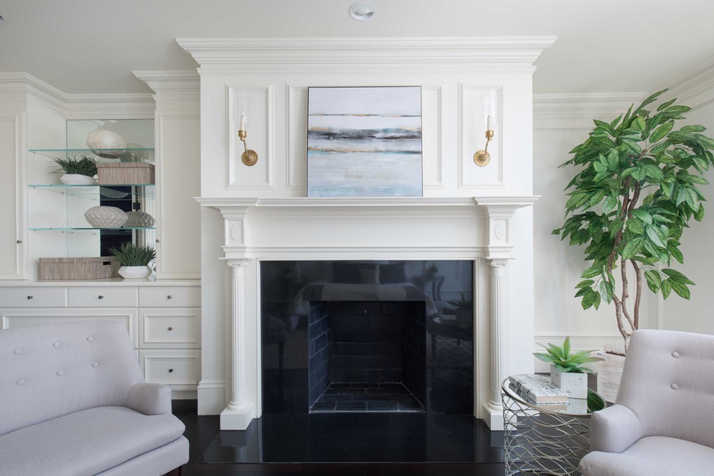 348 Beacon Street, Unit PH Boston, MA 02116 - Photo 22 of 34 a living room with furniture and a fireplace