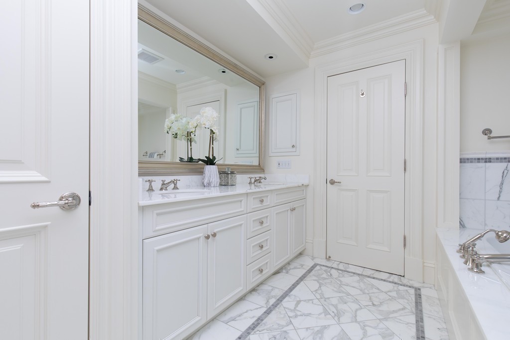 348 Beacon Street, Unit PH Boston, MA 02116 - Photo 24 of 34 a bathroom with a sink and a mirror